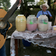 A pulque vendor with various flavors for sale at a pulque celebration in Santiago Cuautlalpan, Mexico.
